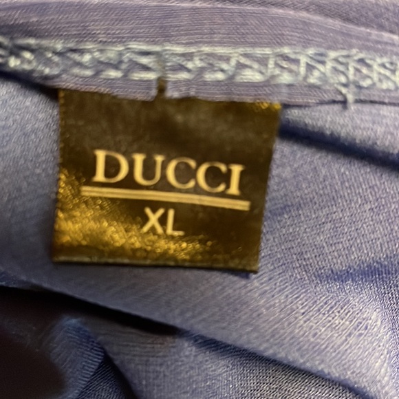 Sleeveless maxi wrap dress with ruffle detailing in a gorgeous shade of blue. - Picture 9 of 10